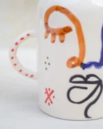 Ourika Visage Vase: Hand-Painted Abstract Face Ceramic - Image 3